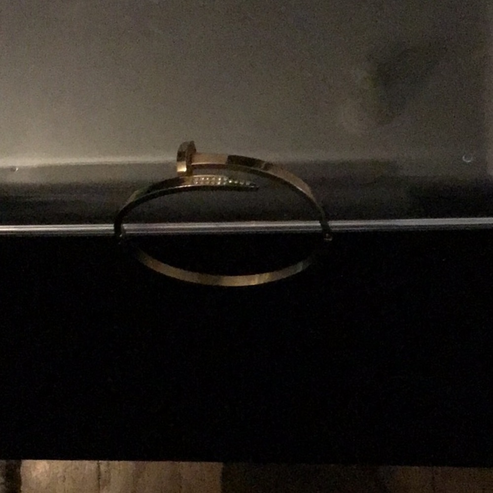 Elegant gold tone Nail Bracelet with Rhinestone Accents. Hinged on one side.EUC - Picture 3 of 6